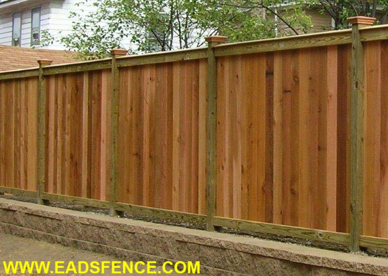 Cedar Good Neighbor Privacy Fence with Angled Cap Board and Federal Post Caps