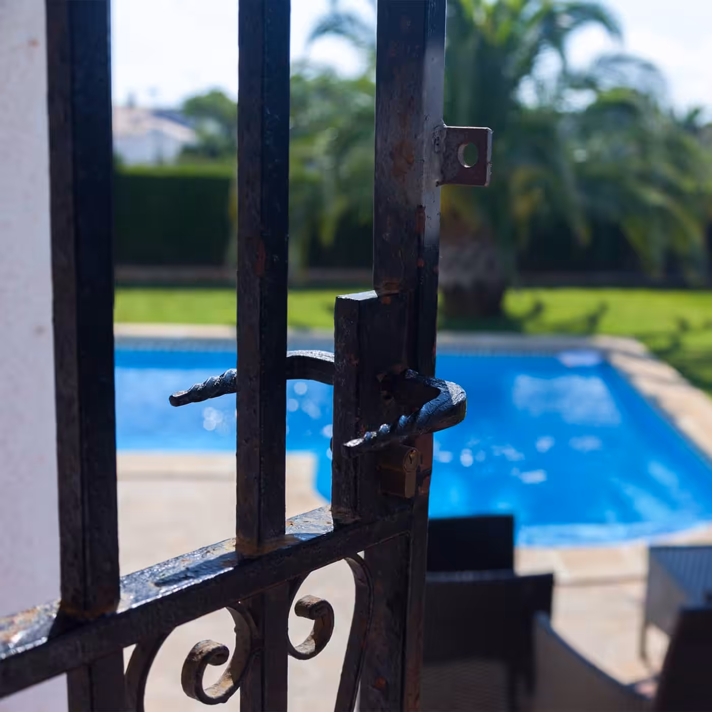 Pool-side barrier placement around an inground pool