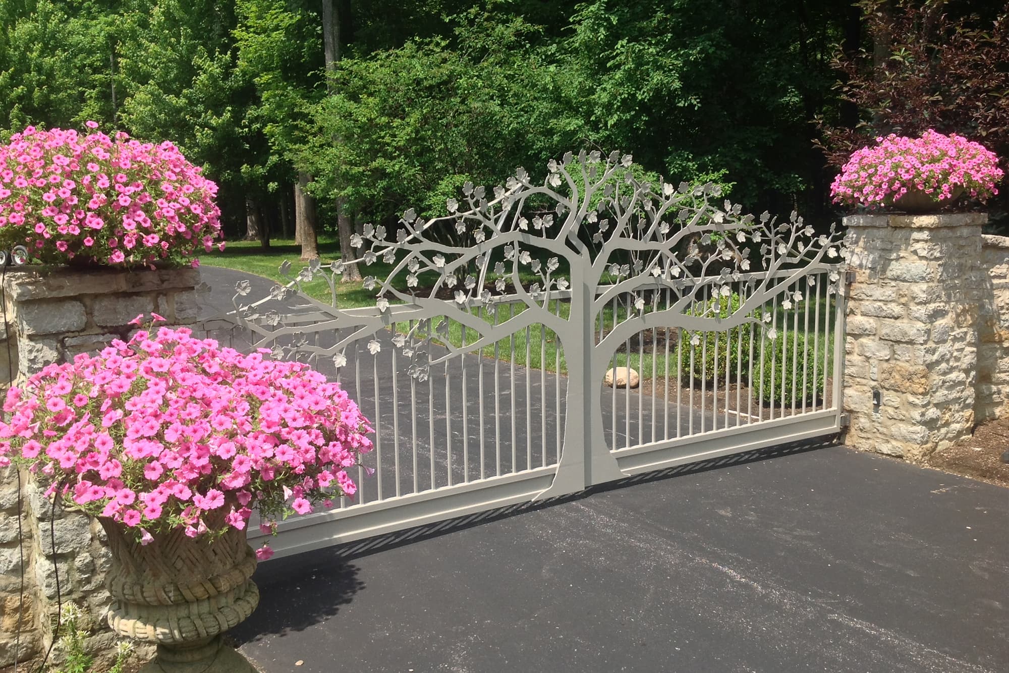A custom entry gate that has a metal tree