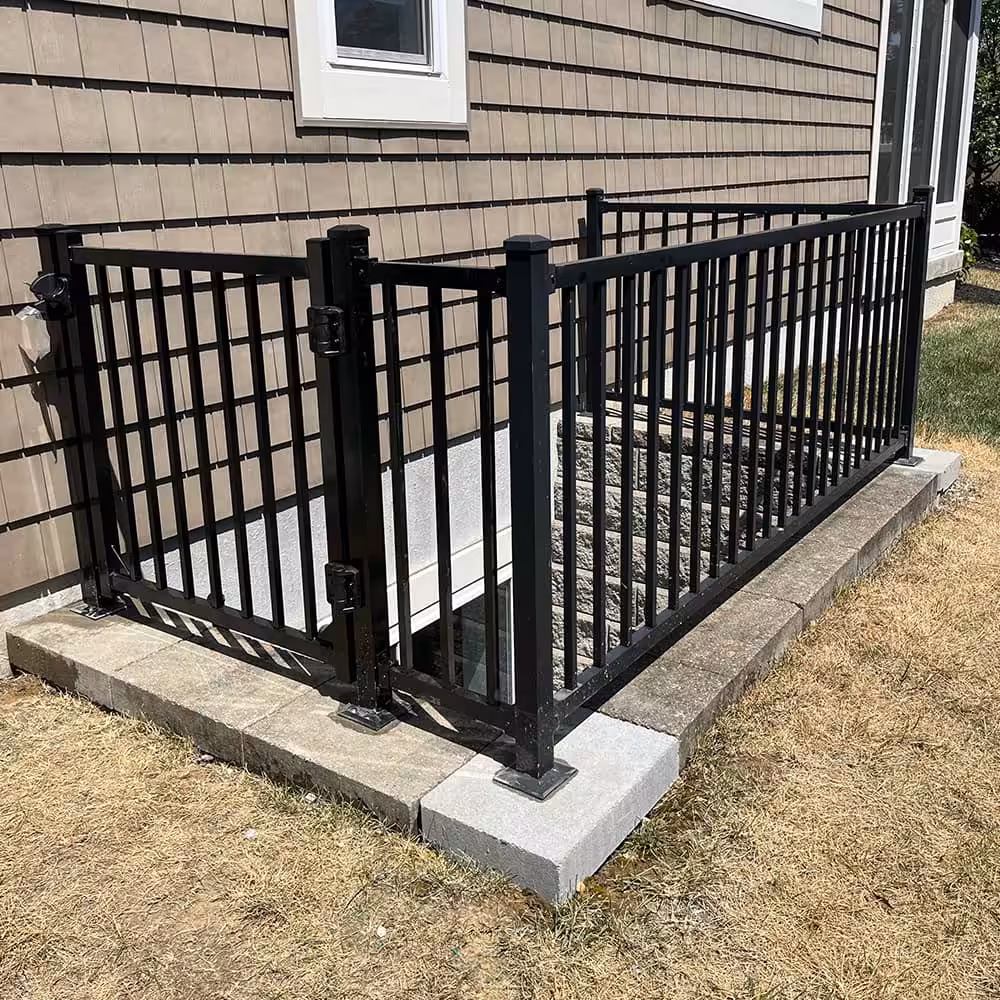 A black window well guard